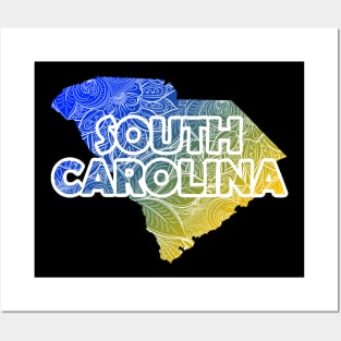 Colorful mandala art map of South Carolina with text in blue and yellow Posters and Art